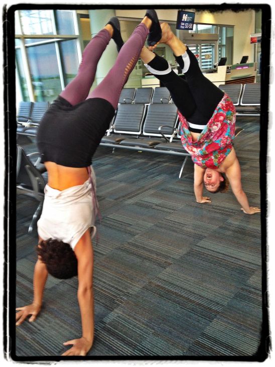 Calia & Helen airport handstands